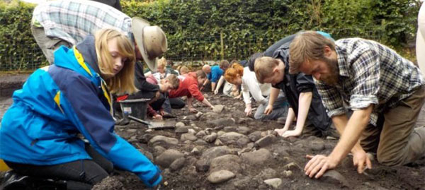 Ribchester Revisited: Revealing debris across the via Sagularis (road around the inside of the fort)